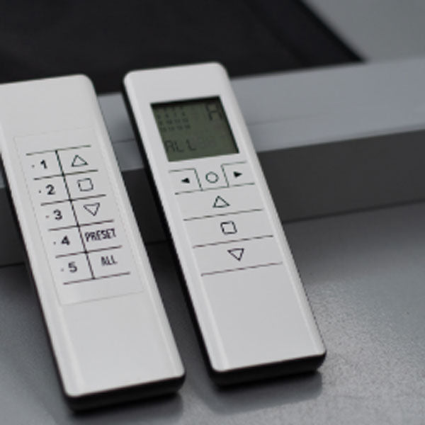 A wall-mounted control keypad for a motorized screen system.